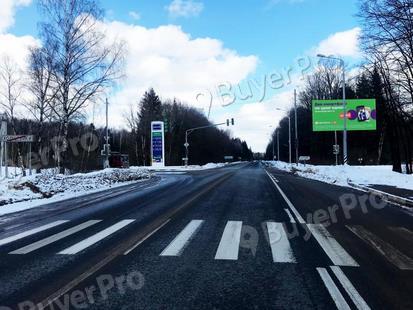 Рекламная конструкция д. Холщевики, напротив поворота в пос. Красный, Волоколамское шоссе, при движении в область, слева (Фото)